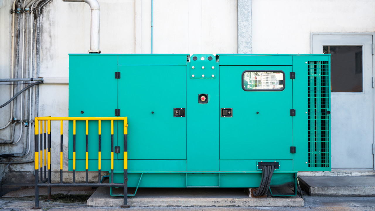 Portable generator with visible engine and control panel, showcasing crankshaft use in power equipment.